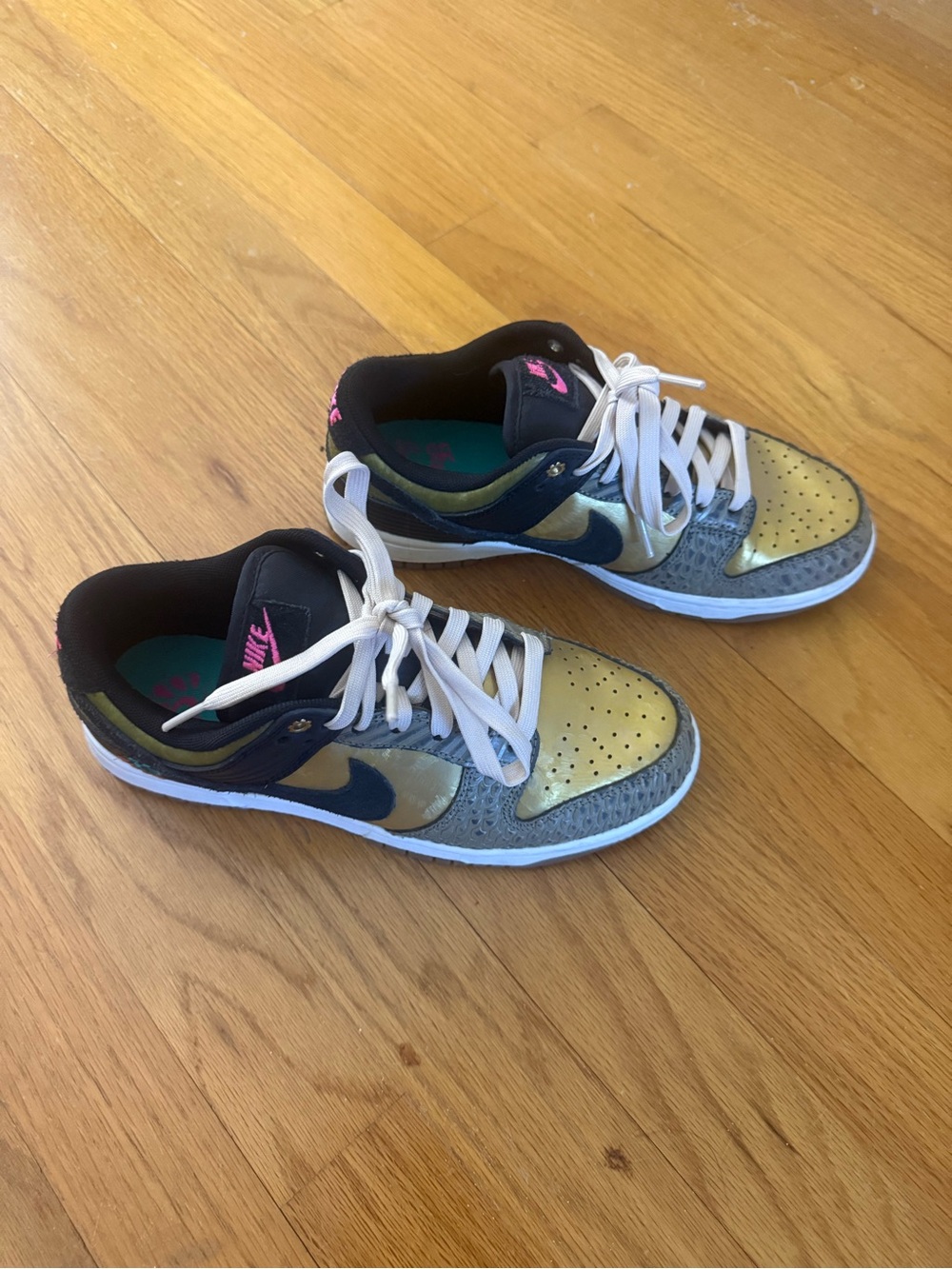 Women’s metallic Gold and Black Athletic Sneakers - Nike